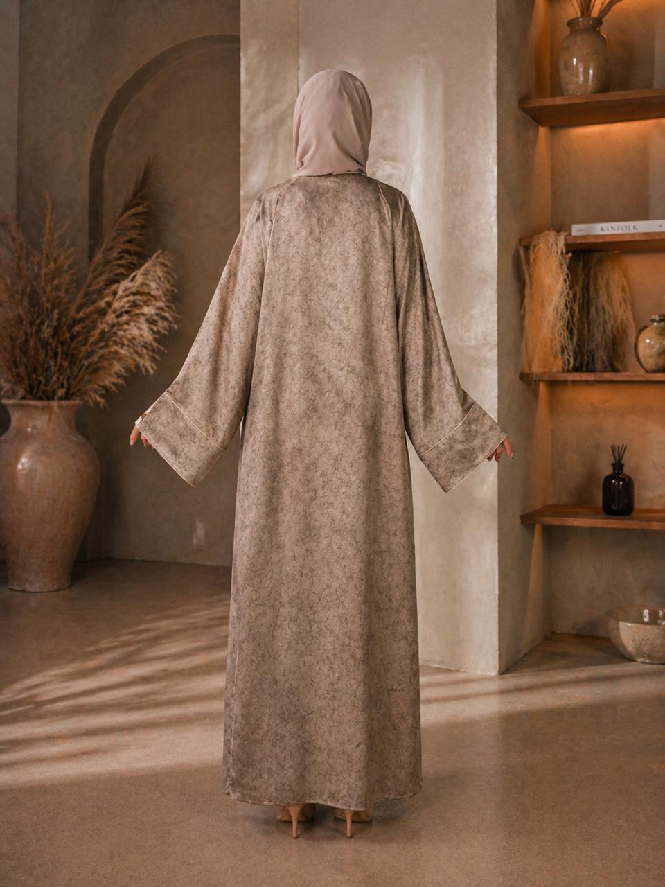 Elegant beige abaya with a soft flowy fit and wide sleeves